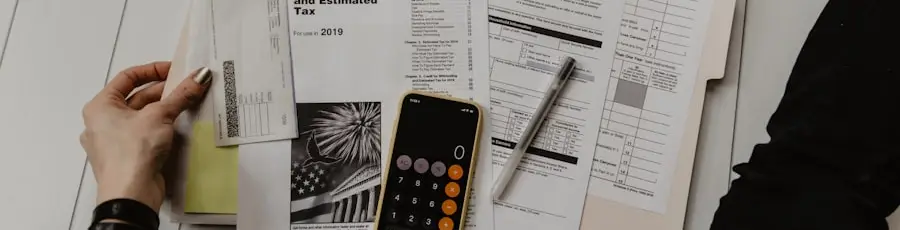 Working through loan payoff paperwork with a calculator
