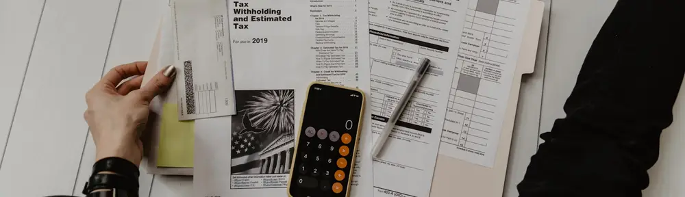 Working through tax forms with a calculator