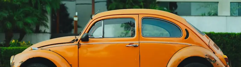 An inherited classic car parked at the curb