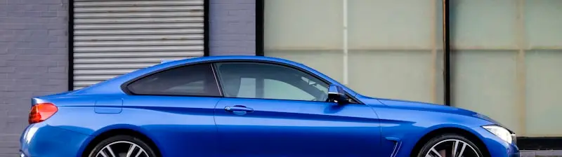 A car parked curbside, ready for its listing photos