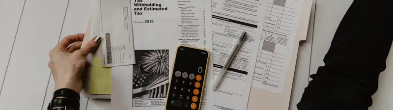 Working through tax forms with a calculator