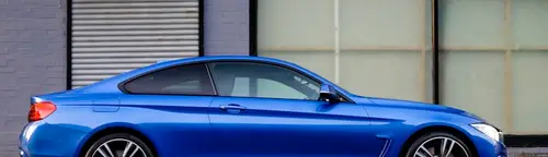A car parked curbside, ready for its listing photos