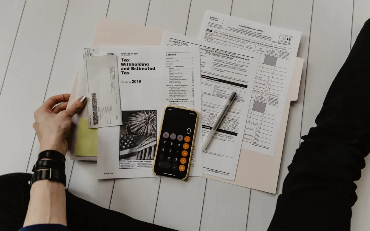 Working through tax forms with a calculator
