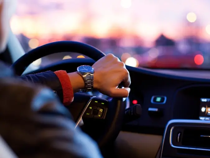 Behind the wheel at dusk after a long day of selling